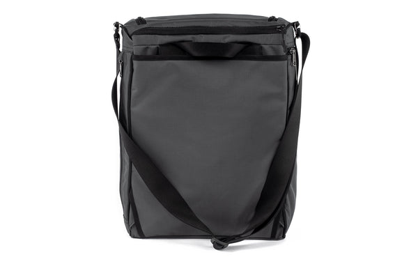 Back of Cambiata with backpack straps tucked away and shoulder strap attached.